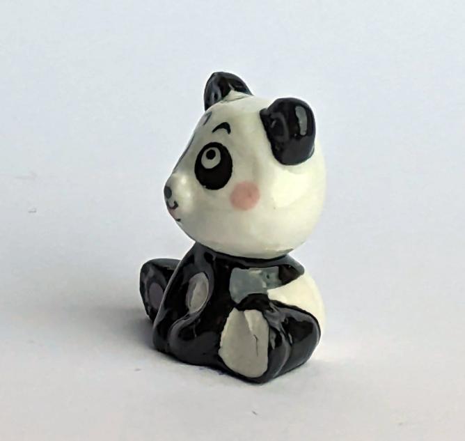 sitzender Panda 